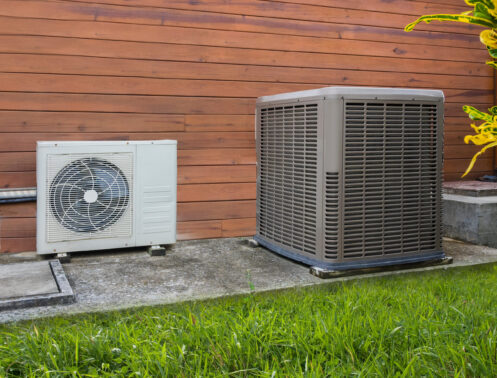 AC & heat pump in the backyard of an O'Fallon home