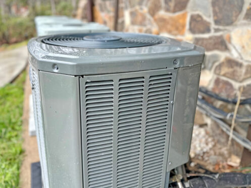 A new eco-friendly HVAC system next to an O'Fallon home.
